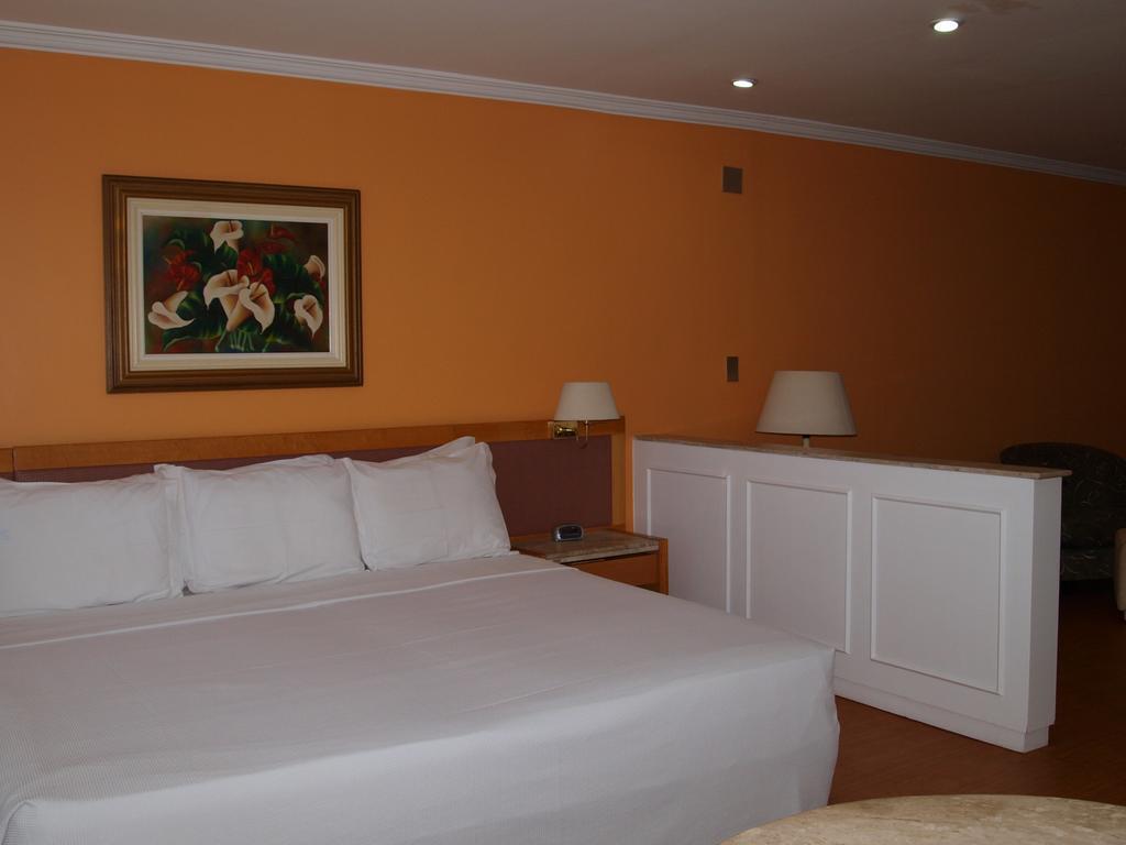 Hotel Sol Belo Horizonte Quarto foto